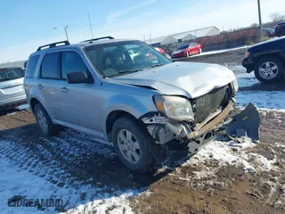 2010 Mercury Mariner with VIN 4M2CN8B72AKJ30465, listed as a IAAI auction lot 41554592 with 110,973 mi miles. Bid and sale history available at carsss.com. Image 1.
