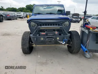 2018 Jeep Wrangler Unlimited Sport S with VIN 1C4HJXDG0JW272837, listed as a Copart auction lot 57532455 with Not provided miles and Salvage title. Bid and sale history available at DreamBid. Image 5.
