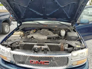 2006 GMC Yukon Denali z VIN 1GKEK63U16J122245, wystawiony jako Copart lot #59211415 z przebiegiem 125 340 mil mil oraz Czysty tytuł • Clean title. Historia ofert i sprzedaży dostępna na DreamBid. Obrazek 12.
