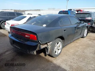 2014 Dodge Charger SE with VIN 2C3CDXBG8EH267589, listed as a IAAI auction lot 41793004 with 154,771 mi miles and . Bid and sale history available at DreamBid. Image 4.