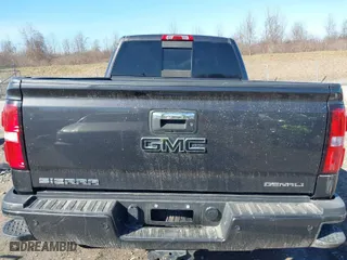 2015 GMC Sierra 2500HD available WiFi Denali with VIN 1GT120E82FF573243, listed as a IAAI auction lot 41824163 with 67,285 mi miles. Bid and sale history available at carsss.com. Image 16.