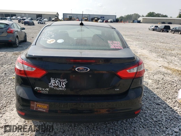 2013 Ford Focus SE z VIN 1FADP3F20DL330366, wystawiony jako Copart lot #59204595 z przebiegiem 163 305 mil mil oraz Szkoda całkowita • Salvage title. Historia ofert i sprzedaży dostępna na DreamBid. Obrazek 6.