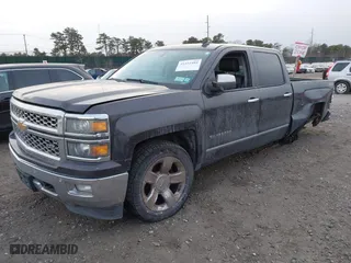 2014 Chevrolet Silverado 1500 LTZ with VIN 3GCUKSEC4EG384636, listed as a IAAI auction lot 41352484 with 153,976 mi miles. Bid and sale history available at carsss.com. Image 2.