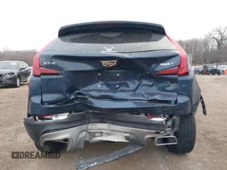 2021 Cadillac XT4 FWD Premium Luxury with VIN 1GYFZCR41MF041306, listed as a IAAI auction lot 41143747 with 53,116 mi miles. Bid and sale history available at carsss.com. Image 16.