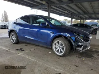 2024 Tesla Model Y Long Range with VIN 7SAYGDEE6RF025366, listed as a Copart auction lot 49328055 with 10,319 mi miles and Salvage Title. Bid and sale history available at DreamBid. Image 4.