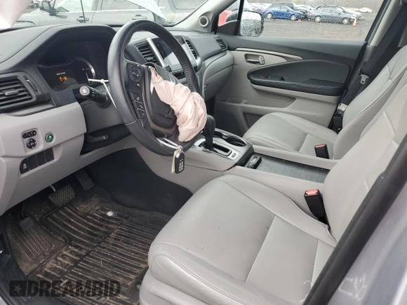 2017 Honda Pilot EX-L with VIN 5FNYF6H54HB103603, listed as a Copart auction lot 52052785 with 117,742 mi miles and Salvage Title. Bid and sale history available at DreamBid. Image 7.