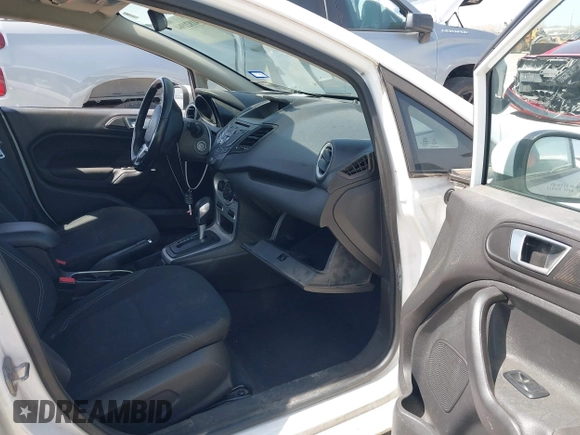 2016 Ford Fiesta SE with VIN 3FADP4BJ7GM175966, listed as a IAAI auction lot 41821964 with 100,375 mi miles. Bid and sale history available at carsss.com. Image 5.