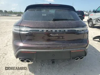 2024 Porsche Macan with VIN WP1AA2A53RLB14849, listed as a Copart auction lot 57979155 with 10,031 mi miles and Salvage title. Bid and sale history available at DreamBid. Image 6.