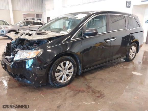 2015 Honda Odyssey EX-L with VIN 5FNRL5H62FB084854, listed as a IAAI auction lot 40959162 with 178,237 mi miles. Bid and sale history available at carsss.com. Image 2.