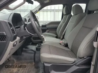 2015 Ford F-150 XLT with VIN 1FTEX1E89FKD82676, listed as a Copart auction lot 50723925 with 65,024 mi miles and Salvage Title. Bid and sale history available at carsss.com. Image 7.