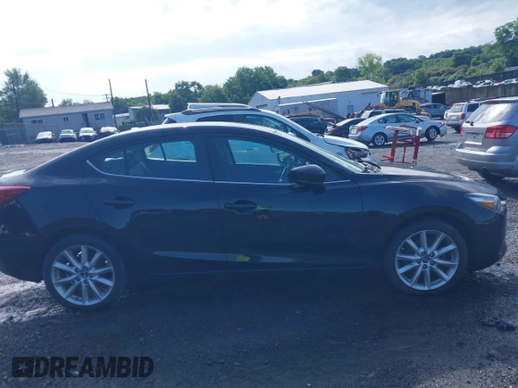 2017 Mazda 3 Touring z VIN 3MZBN1V74HM128575, wystawiony jako IAAI lot #42731487 z przebiegiem 136 553 mil mil oraz . Historia ofert i sprzedaży dostępna na DreamBid. Obrazek 13.