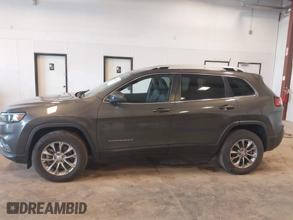 2021 Jeep Cherokee Latitude Lux z VIN 1C4PJMMX5MD194128, wystawiony jako IAAI lot #42257671 z przebiegiem 25 969 mil mil oraz . Historia ofert i sprzedaży dostępna na DreamBid. Obrazek 14.