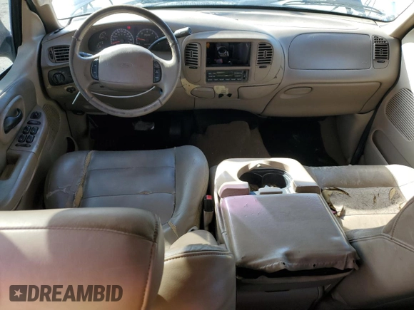 2002 Ford F-150 XLT with VIN 1FTRW07L52KA67609, listed as a Copart auction lot 87720715 with 177,615 mi miles and Salvage Title. Bid and sale history available at carsss.com. Image 8.