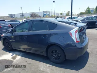 2015 Toyota Prius Four with VIN JTDKN3DUXF0401038, listed as a IAAI auction lot 42461797 with 142,302 mi miles and . Bid and sale history available at DreamBid. Image 14.