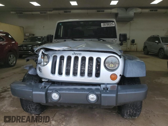 2012 Jeep Wrangler Sport with VIN 1C4AJWAGXCL133013, listed as a Copart auction lot 59788325 with 141,015 mi miles and Clean title. Bid and sale history available at DreamBid. Image 5.