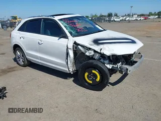 2018 Audi Q3 Premium z VIN WA1BCCFS0JR001134, wystawiony jako IAAI lot #42311848 z przebiegiem 154 576 mil mil oraz . Historia ofert i sprzedaży dostępna na DreamBid. Obrazek 1.