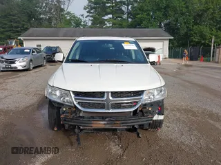 2013 Dodge Journey Crew with VIN 3C4PDCDG0DT591533, listed as a IAAI auction lot 42630548 with 164,961 mi miles and . Bid and sale history available at DreamBid. Image 12.