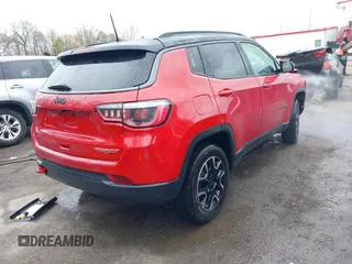 2019 Jeep Compass Trailhawk with VIN 3C4NJDDB6KT786348, listed as a IAAI auction lot 41963536 with 58,598 mi miles and . Bid and sale history available at DreamBid. Image 4.