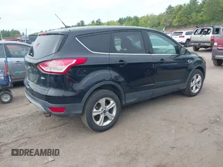 2016 Ford Escape SE with VIN 1FMCU9G96GUC31705, listed as a IAAI auction lot 42251216 with 118,270 mi miles and . Bid and sale history available at DreamBid. Image 4.