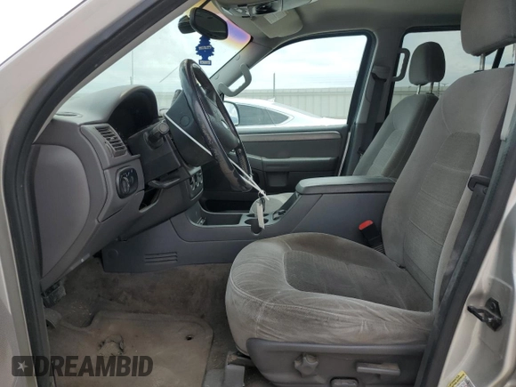 2004 Ford Explorer XLT with VIN 1FMZU73K24ZA81744, listed as a Copart auction lot 61054215 with 159,414 mi miles and Salvage title. Bid and sale history available at DreamBid. Image 7.