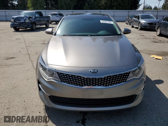 2016 Kia Optima EX with VIN 5XXGU4L30GG104013, listed as a Copart auction lot 54220105 with 120,073 mi miles and Salvage Title. Bid and sale history available at carsss.com. Image 5.