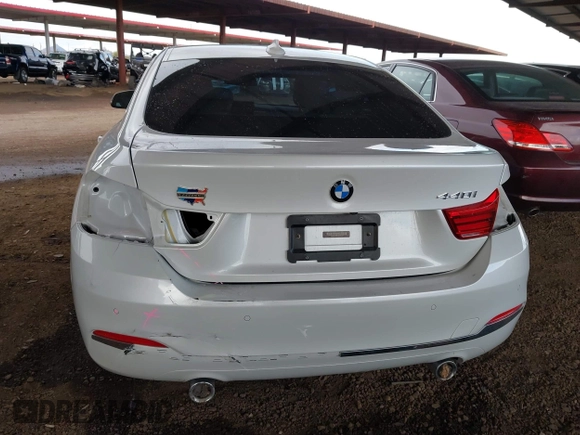 2018 BMW 4 Series 440i with VIN WBA4J5C56JBF07770, listed as a IAAI auction lot 41948710 with 69,655 mi miles and . Bid and sale history available at carsss.com. Image 20.