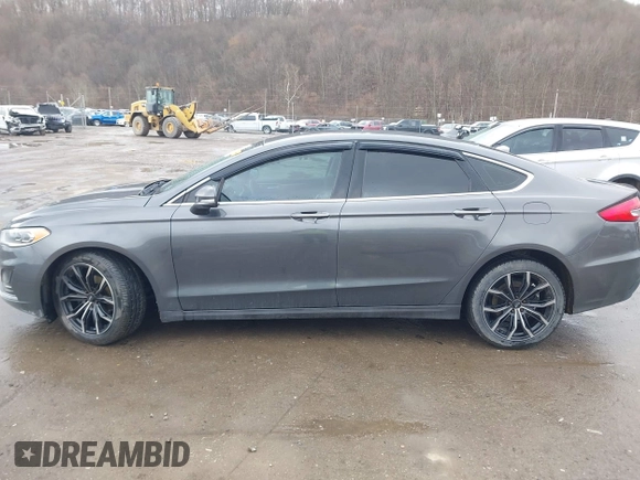 2019 Ford Fusion SEL with VIN 3FA6P0CD6KR141832, listed as a IAAI auction lot 41800102 with 142,282 mi miles and . Bid and sale history available at DreamBid. Image 15.