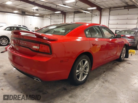 2013 Dodge Charger SXT z VIN 2C3CDXJG6DH528802, wystawiony jako IAAI lot #42172409 z przebiegiem 77 107 mil mil oraz . Historia ofert i sprzedaży dostępna na DreamBid. Obrazek 4.