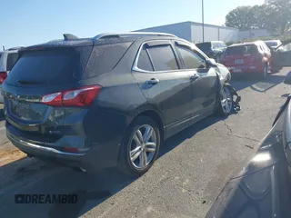 2018 Chevrolet Equinox Premier with VIN 3GNAXNEX7JS508096, listed as a IAAI auction lot 40656660 with 136,312 mi miles. Bid and sale history available at carsss.com. Image 4.