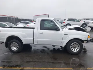 2002 Mazda B-Series 2WD Truck DS with VIN 4F4YR12U82TM11900, listed as a IAAI auction lot 40773356 with 118,353 mi miles. Bid and sale history available at carsss.com. Image 13.