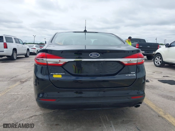 2018 Ford Fusion Hybrid SE with VIN 3FA6P0LU9JR286359, listed as a IAAI auction lot 41973064 with 145,267 mi miles. Bid and sale history available at carsss.com. Image 16.