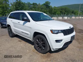 2018 Jeep Grand Cherokee Altitude with VIN 1C4RJFAG9JC162874, listed as a IAAI auction lot 42396844 with 102,321 mi miles and . Bid and sale history available at DreamBid. Image 1.