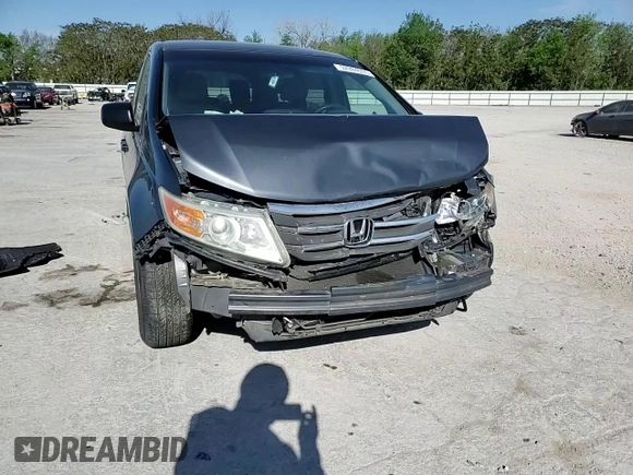 2013 Honda Odyssey LX z VIN 5FNRL5H26DB058364, wystawiony jako Copart lot #52984905 z przebiegiem 165 779 mil mil oraz Szkoda całkowita • Salvage title. Historia ofert i sprzedaży dostępna na DreamBid. Obrazek 12.