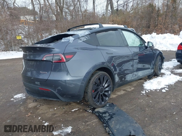 2023 Tesla Model Y Performance with VIN 7SAYGDEF0PF834822, listed as a IAAI auction lot 41547678 with Not Provided miles and . Bid and sale history available at DreamBid. Image 4.