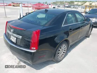 2013 Cadillac CTS Luxury with VIN 1G6DE5E50D0101763, listed as a IAAI auction lot 42090577 with 105,097 mi miles and . Bid and sale history available at DreamBid. Image 4.