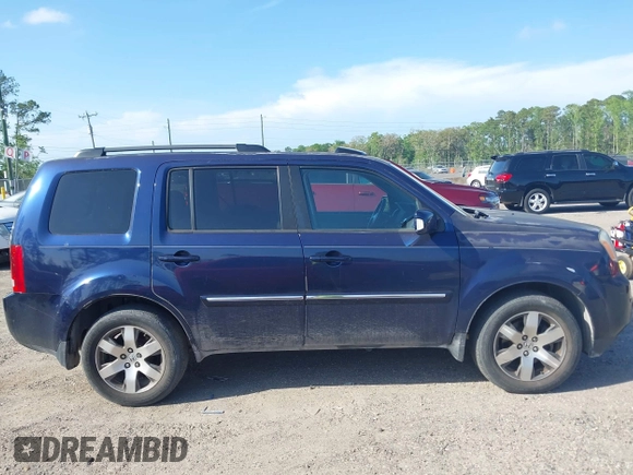 2014 Honda Pilot Touring with VIN 5FNYF4H92EB019248, listed as a IAAI auction lot 41942963 with 136,183 mi miles and . Bid and sale history available at carsss.com. Image 13.