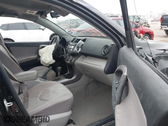 2006 Toyota RAV4 with VIN JTMZK33V965001685, listed as a IAAI auction lot 40995034 with 254,383 mi miles. Bid and sale history available at carsss.com. Image 5.