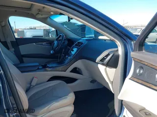 2019 Lincoln Nautilus Reserve with VIN 2LMPJ6LP3KBL51283, listed as a IAAI auction lot 41204810 with 91,184 mi miles. Bid and sale history available at carsss.com. Image 5.