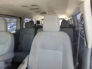 2015 Ford Transit Passenger XL with VIN 1FBZX2YGXFKA48977, listed as a Copart auction lot 77980594 with 112,364 mi miles and Clean Title. Bid and sale history available at carsss.com. Image 10.