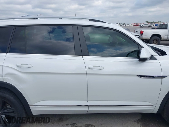 2022 Volkswagen Atlas SEL R-Line z VIN 1V2AR2CA7NC550648, wystawiony jako IAAI lot #41974370 z przebiegiem 48 378 mil mil oraz . Historia ofert i sprzedaży dostępna na DreamBid. Obrazek 13.
