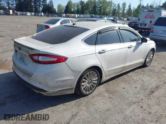 2016 Ford Fusion Titanium Hybrid with VIN 3FA6P0RU2GR357739, listed as a IAAI auction lot 42120441 with 151,201 mi miles. Bid and sale history available at carsss.com. Image 4.