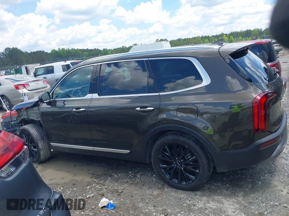 2022 Kia Telluride SX with VIN 5XYP5DHC3NG306763, listed as a IAAI auction lot 42267394 with 110,000 mi miles and . Bid and sale history available at DreamBid. Image 14.