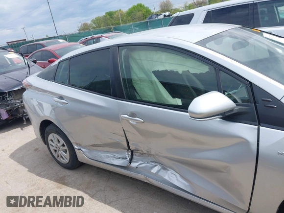 2016 Toyota Prius Two z VIN JTDKBRFU7G3002502, wystawiony jako IAAI lot #42241469 z przebiegiem 120 049 mil mil oraz . Historia ofert i sprzedaży dostępna na DreamBid. Obrazek 13.