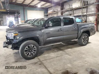 2023 Toyota Tacoma SR with VIN 3TMCZ5ANXPM592203, listed as a Copart auction lot 62761805 with 11,227 mi miles and Salvage title. Bid and sale history available at DreamBid. Image 1.