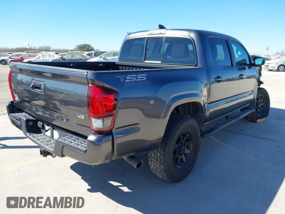 2023 Toyota Tacoma 4WD SR with VIN 3TYCZ5AN1PT146719, listed as a IAAI auction lot 41406963 with 19,735 mi miles. Bid and sale history available at carsss.com. Image 4.