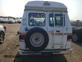 1992 Chevrolet Chevy Van z VIN 2GBEG25K3N4117707, wystawiony jako Copart lot #67318524 z przebiegiem 181 994 mil mil oraz Szkoda całkowita • Salvage title. Historia ofert i sprzedaży dostępna na DreamBid. Obrazek 6.