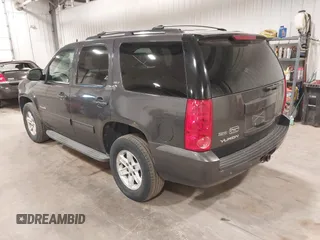 2010 GMC Yukon SLT with VIN 1GKUKCE08AR148548, listed as a IAAI auction lot 41994933 with 248,534 mi miles. Bid and sale history available at carsss.com. Image 3.