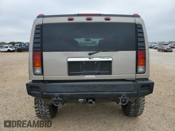 2003 Hummer H2 with VIN 5GRGN23U73H102412, listed as a Copart auction lot 87419024 with 176,456 mi miles and Salvage Title. Bid and sale history available at carsss.com. Image 6.