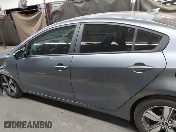 2018 Kia Forte LX with VIN 3KPFL4A76JE210647, listed as a IAAI auction lot 41838853 with 148,488 mi miles and . Bid and sale history available at DreamBid. Image 15.