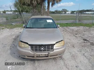 1998 Cadillac Catera z VIN W06VR52R3WR179841, wystawiony jako IAAI lot #41535621 z przebiegiem 103 204 mil mil oraz . Historia ofert i sprzedaży dostępna na DreamBid. Obrazek 6.